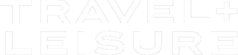 White text on a light gray background reads "TRAVEL + LEISURE" in large, bold, uppercase letters.